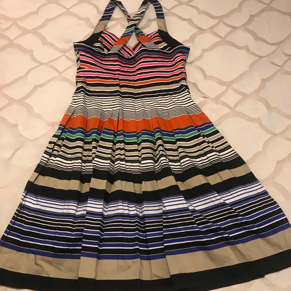 Calvin Klein Size 10 pleated cross strap dress is great for your wardrobe.